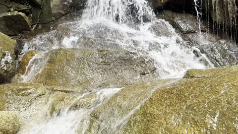 Rushing Water Over Rocks: Powerful Rock Waterfall Video stock 233274445
