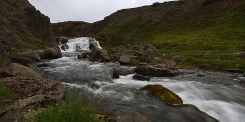 Rushing water timelapse from a Remote Mountain Waterfall in a Stream in Iceland 動画素材 94741811
