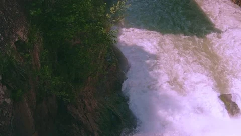 The rushing water of a waterfall Stock Footage 234991604