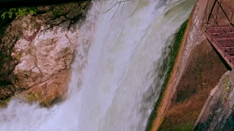 The rushing water of a waterfall Stock Footage 234991812