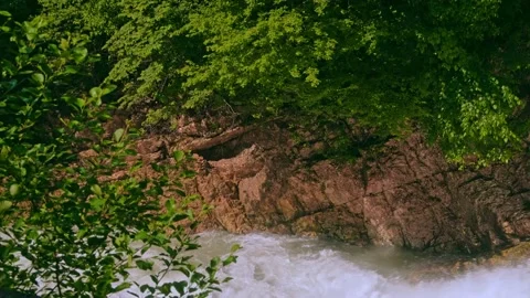 The rushing water of a waterfall Stock Footage 234992288