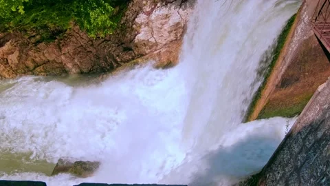 The rushing water of a waterfall Stock Footage 234992543