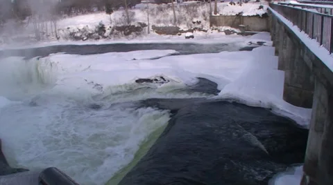Rushing waterfalls and  river with snow and ice. #17 Stock Footage 34643247