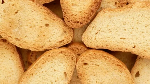 Rusks, rotation. Pieces of dried bread, top view. Stock Footage 140975683