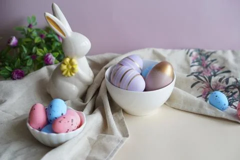 Russia - April 2023: spring with Easter composition with a white porcelain rabbi 写真素材