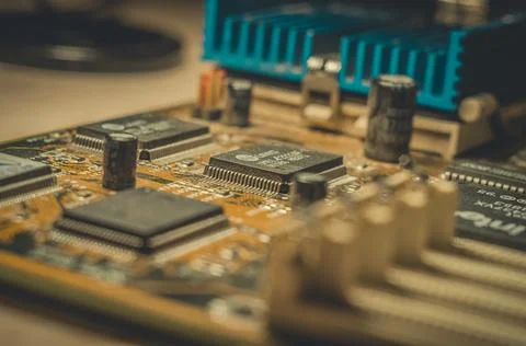 RUSSIA, BERDSK - 2021: Computing chip on an old motherboard. Old electronics Stock Photos