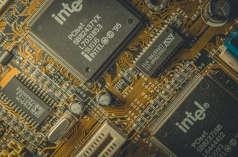 RUSSIA, BERDSK - 2021: Intel computing chip on an old motherboard. Old Stock Photos