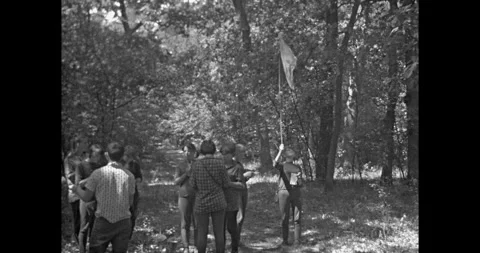 Russia - circa 1970s: Group of Soviet youth raising a flag Stock Footage 333130240
