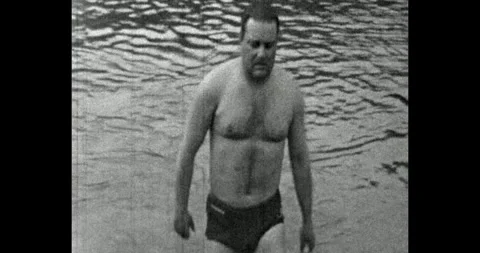 Russia - circa 1970s: Man Cold While Swimming Outdoors Stock Footage 340330822