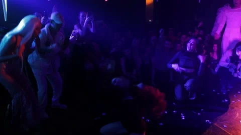 RUSSIA, KAZAN 20-02-2022: a sexy active girl dances on the floor in a nightclub Stock Footage