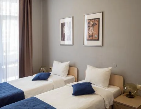 Russia Sochi 08.04.2019. Two single, made beds in a clean and comfortable room Stock Photos
