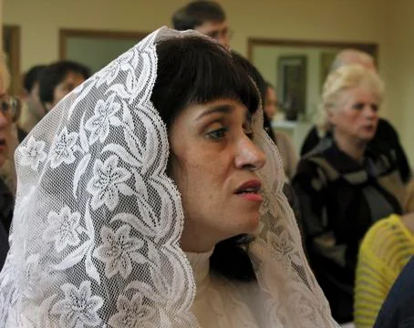 Russia sunday mass at catholic church yuzhno Stock Photos