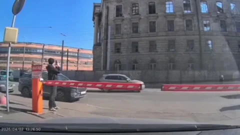 Russia: Wall collapse during demolition narrowly misses passing vehicles ... Stock Footage 332150526