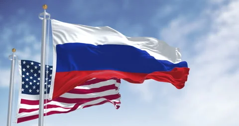 Russian and American flags waving side by side in wind. 3D render Stock Footage 326239853