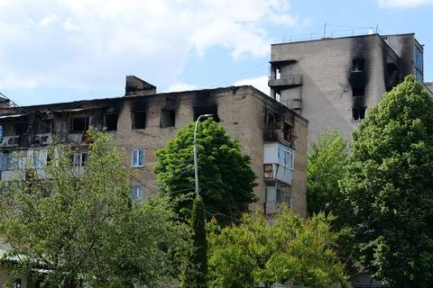 Russian armed forces damaged by a shell dwelling house in Bucha town, Ukraine 스톡 사진