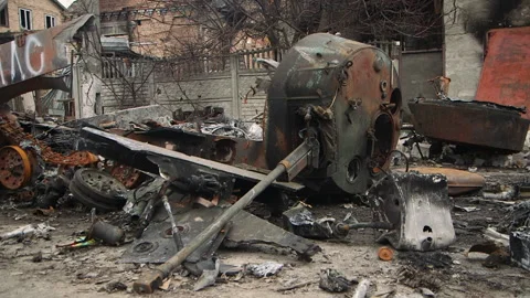 Russian armored vehicle trashed in Bucha town 스톡 동영상 218377876