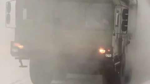 Russian Army - Mobile missile complex rides on a winter forest road Stock Footage 245166503