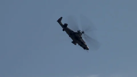 Russian attack helicopter KA-52 Alligator performs aerobatic maneuvers. Stock Footage 107584348