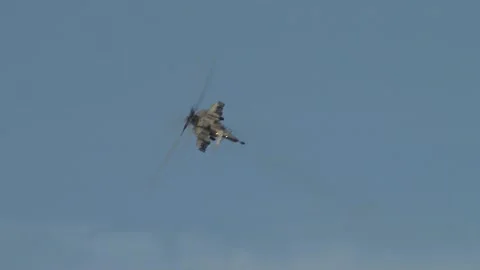 Russian attack helicopter Mi-28N "Night hunter" (Havoc) perform left turn. Stock Footage 220844238