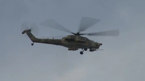 Russian attack helicopters Mi-28N "Night hunter" perform aerobatic maneuvers Stock Footage 220844262