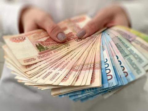 Russian banknotes of different denominations close-up.Finance concept. Stock Photos