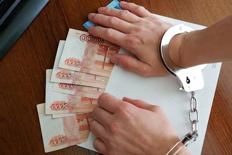 Russian banknotes in an envelope on the table. The concept of a bribe. Women's Stock Photos