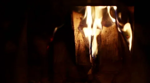 Russian bathhouse. Close-up shot of the flame in the furnace of the wood stove Stock-Footage 63640610