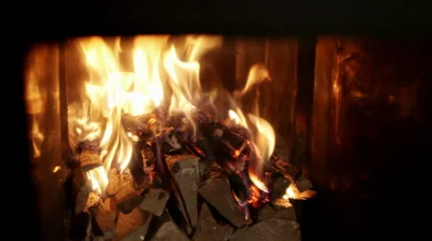 Russian bathhouse. Close-up shot of the flame in the furnace of the wood stove 库存影片 63640680