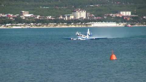 Russian Beriev Be-103 light amphibious aircraft floats in sea like boat. Stock Footage 125610768