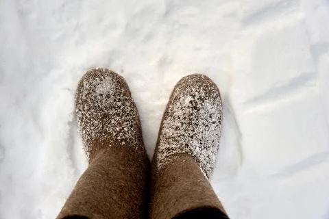 Russian boots in the snow on a cold winter day. Stock Illustration