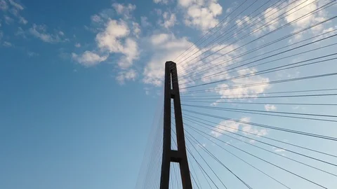 Russian bridge on a background of blue sky with clouds. 库存影片 116663410