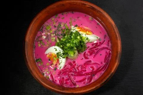 Russian cabbage soup with beetroot.- Borsht with egg and onion. Фото