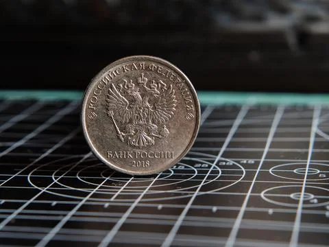Russian Coin on Geometric Pattern Background Stock Photos