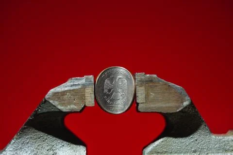 The Russian coin in vise Stock Photos