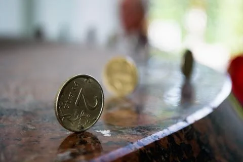 Russian coins standing on the granite table Stock Photos