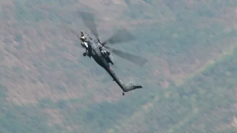 Russian combat helicopter Mi-28N flies over waters of the Gelendzhik Bay. Stock Footage 132106925