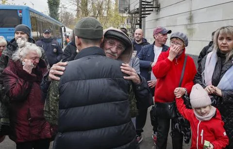 Russian conscripted men at a Moscow recruiting office during Russia's partial mi Stockfoto's
