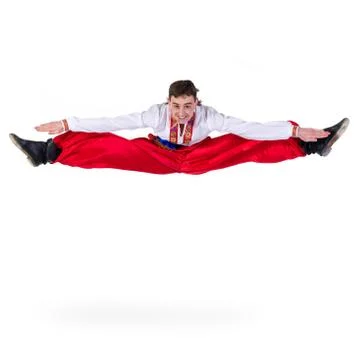 Russian cossack dance. Young dancer jumping Stock Photos