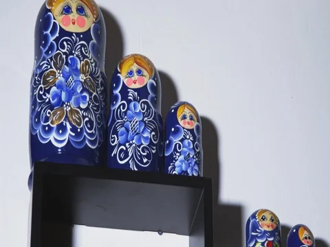 Russian dolls stand on the shelf Stock Footage 83340052