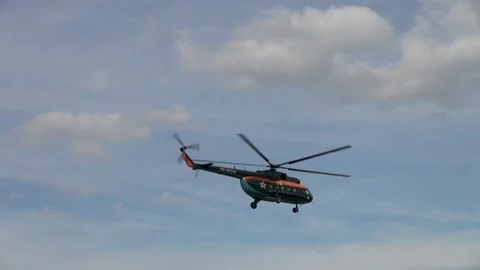 Russian DOSAAF helicopter Mi-8 (NATO: "Hip") climbs vertically and flies. Stock Footage 139761826