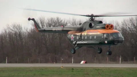 Russian DOSAAF helicopter Mi-8 (NATO: "Hip") climbs vertically and flies. Stock Footage 139761870