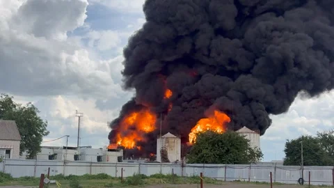 Russian Drone Strike Sparks Massive Fire at Oil Depot in Ukraine Stock Footage 339227954