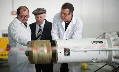Russian engineers prepare the escape tower prior to attaching it to the So... Stock Photos