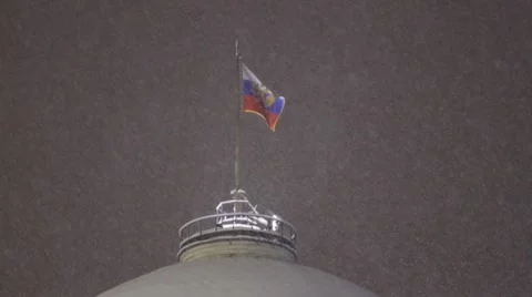 Russian Federation flag over the Kremlin during a snowfall, Moscow, Russia Stock Footage 45296790