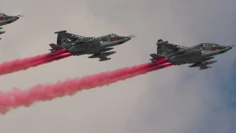 Russian Fighter planes in sky leaving trail of smoke as tricolor Russian flag Stock Footage 153716699