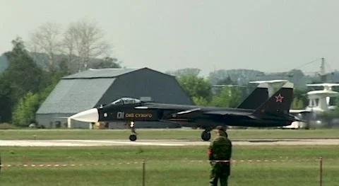 Russian fighter Su-47 Berkut (NATO - Firkin) accelerate along runway. Stock Footage 175158032