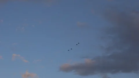 Russian fighters fly in the evening sky 4k Stock Footage 111817055