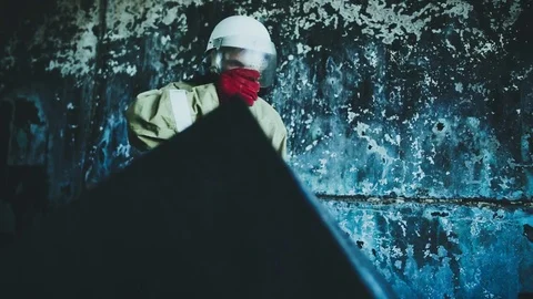 Russian fireman exploring buildin after fire cheking room Stock Footage 79056217