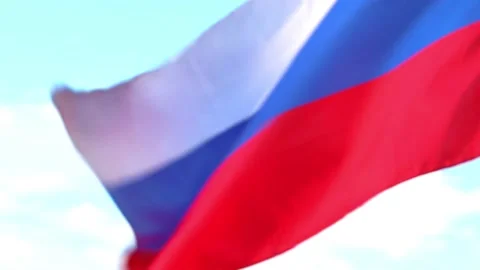 Russian flag against blue sky Stock Footage 189780798