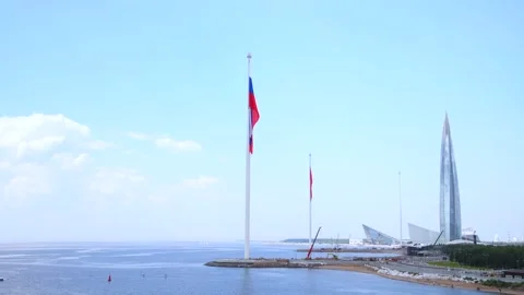 Russian flag and office building on sea coast Stock Footage 247406892